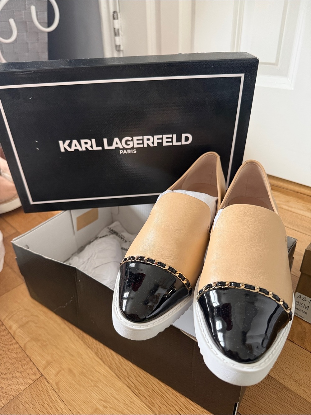 Karl Lagerfeld Beige Slip-On Sneakers with Black Patent Cap and Chain Trim